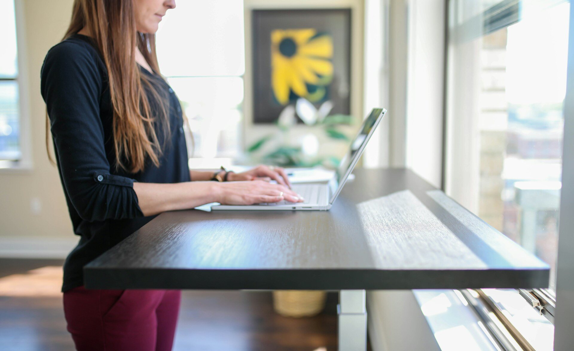 Woman using a standing desk