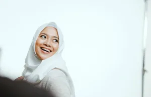 Woman in a hijab smiling
